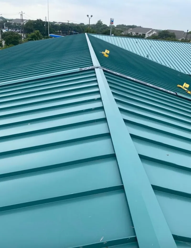 Green commercial metal roof ridge and valley for Metal Roof Repair in Venersborg