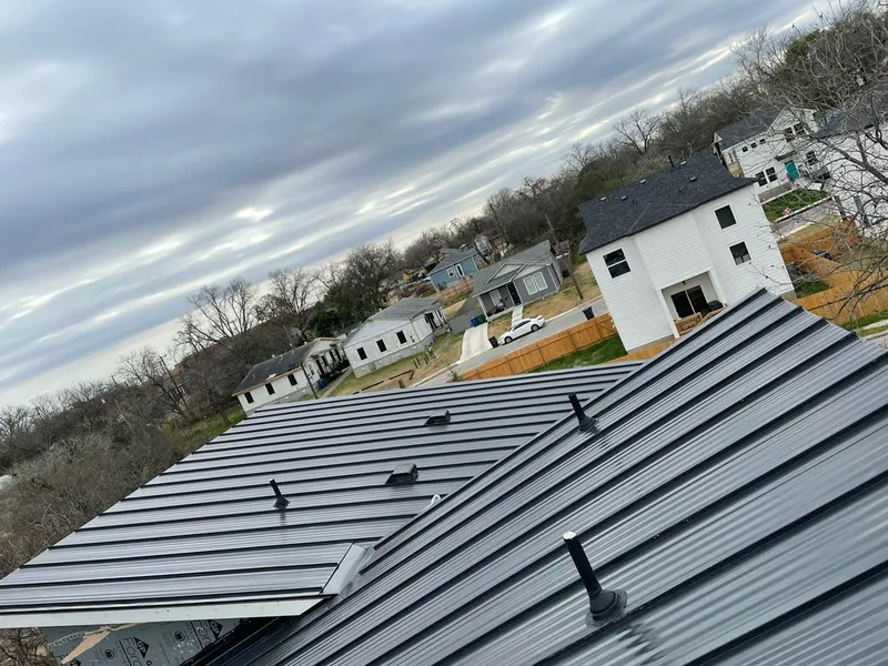 Standing seam metal roof panels with vents for Skylight Repair in Venersborg